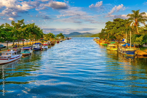 Canal in historical center of Paraty, Rio de Janeiro, Brazil. Paraty is a preserved Portuguese colonial and Brazilian Imperial municipality. Cityscape of Paraty