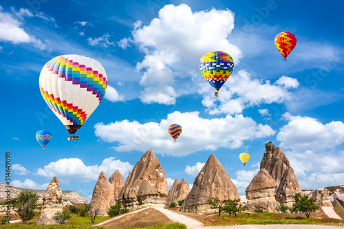 The great tourist attraction of Cappadocia - balloon flight. Cappadocia is known around the world as one of the best places to fly with hot air balloons. Goreme, Cappadocia, Turkey. Travel concept. Ar