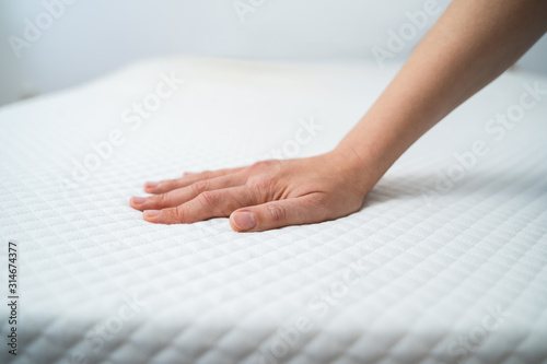 Hand Testing Mattress