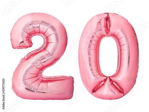 Number 20 twenty made of rose gold inflatable balloons isolated on white background. Pink helium balloons forming 20 twenty number. Discount and sale or birthday concept