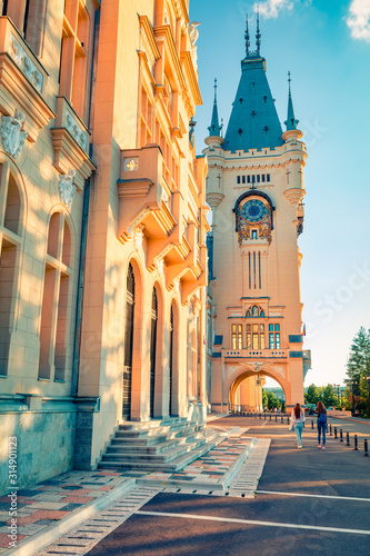 Bright evening view of Cultural Palace Iasi. Attractive summer cityscape of Iasi town, capital of Moldavia region, Romania, Europe. Architecture traveling background.