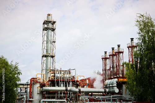 Installation of cogeneration of electricity and production of superheated steam with equipment and high pipes at an oil refining petrochemical chemical industrial plant