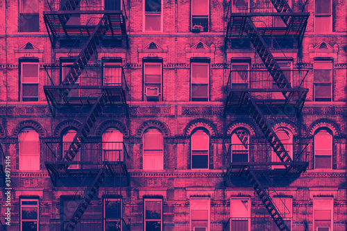 Colorful old pink and blue buildings in the East Village neighborhood of Manhattan in New York City