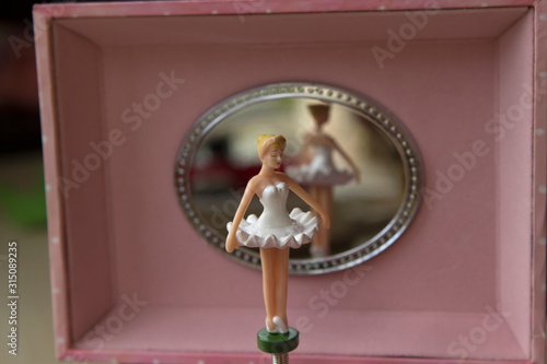 pink music box with ballerina and a mirror