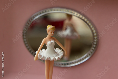 pink music box with ballerina and a mirror