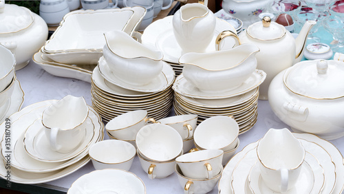 Wroclaw, Poland - 01.12.2019: huge white porcelain set on the Flea Market, swap meet in Wroclaw, Poland.