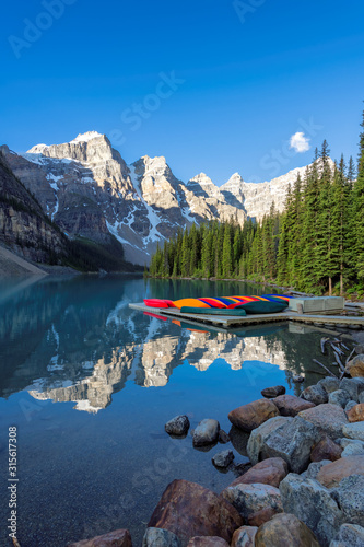 Beautiful Moraine Lake at sunrise in Rocky Mountains, Banff National Park, Canada. 