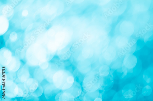Abstract blue bokeh of blurry lights background