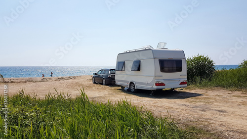trailer caravan car by the sea, holidays in the nature outdoor by the sea