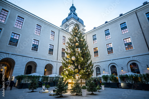 Giant illuminated Christmas tree in Saint-Martin courtyard of Grand Hotel Dieu Lyon France