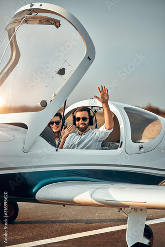Pilot aviator welcomes waving before fly