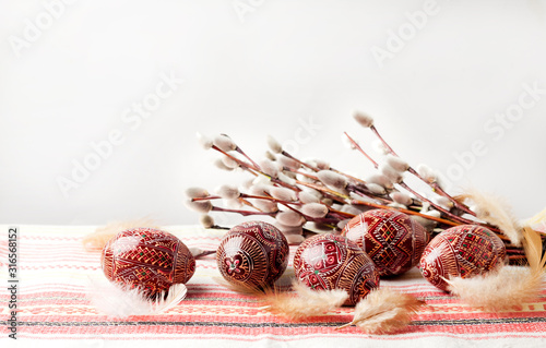 Easter still life with Pysanka on traditional Ukrainian cloth. Decorated Easter eggs, traditional for Eastern Europe culture