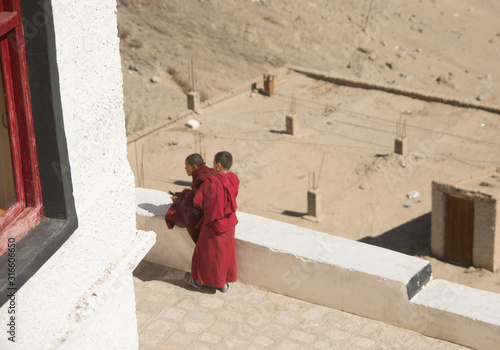 buddhist monks in tikshey monastery in ladakh, India
