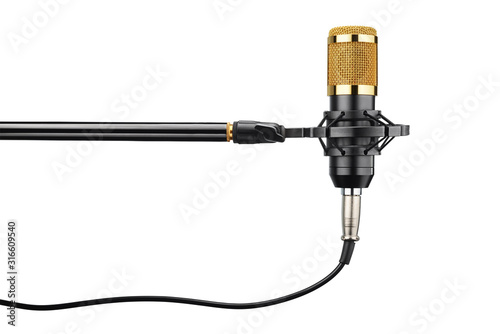 Golden studio condenser microphone isolated on white