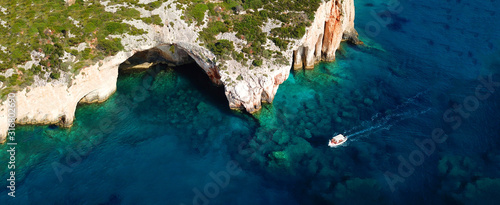 Aerial drone ultra wide photo of famous blue caves in North part of Zaktynthos island, Ionian, Greece