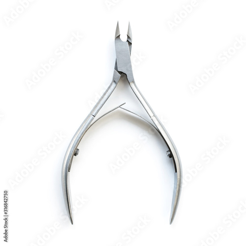 Nail clippers on a white background isolated. Cuticle nippers. Manicure and pedicure tool. For beauty salon and online store.