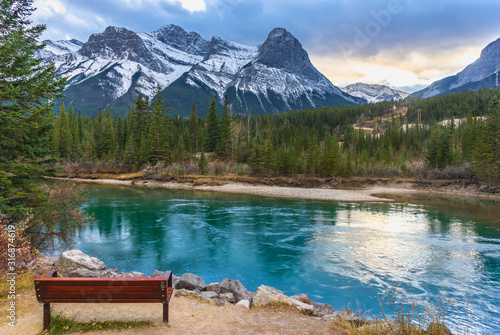 Ice-capped mountain peaking in the background in Banff National Park