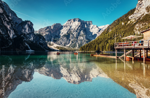 Braies lake during sunrise, popular Touristic Place in Dolomites Alps. Italy Picture of wild area Europe. Wonderful nature Landscape