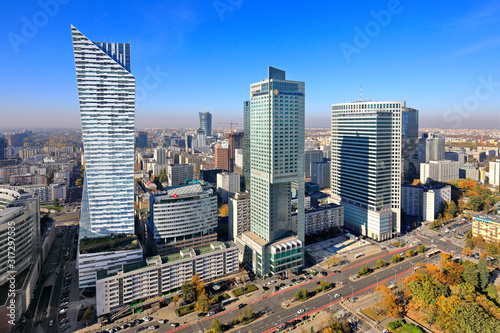 Panoramic aerial view of the skyscrapers - Zlota 44, Intercontinental and Warsaw Financial Center at the Emilii Plater street - in the Srodmiescie downtown district of Warsaw, Poland