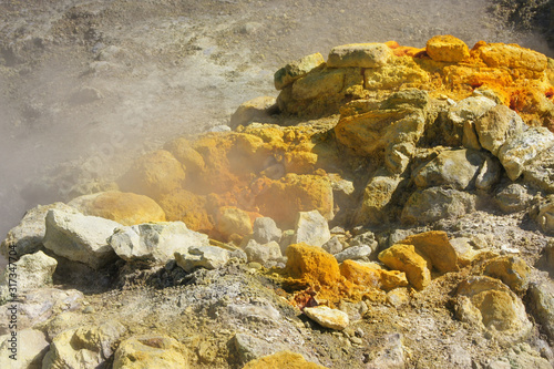 A sulfurous fumarole in the Solfatara volcano in Pozzuoli near Naples. A fumarole is an opening in the crust of the earth emitting gases or steam.