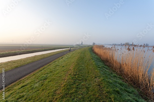 Scenery of a Dutch polder landscape under the clear sky