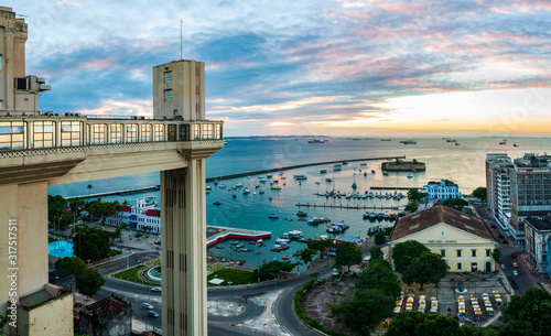 Sunset view of "Elevador Lacerda", "Mercado Modelo" and "Bahia de todos os santos". Salvador, Bahia, Brazil.