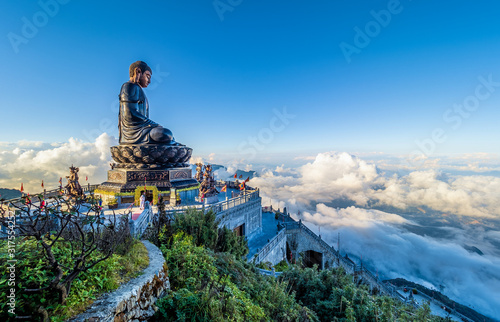 Landscape with .Giant Buddha statue on the top of mount Fansipan, Sapa region, Lao Cai, Vietnam