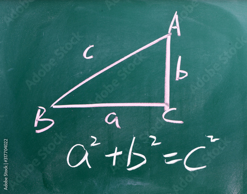 Right triangle with pythagorean formula on a blackboard