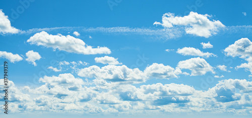 Fluffy Clouds In Blue Sky. Background From Clouds.