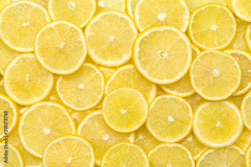 Fresh lemon slices pattern backgrond, close up