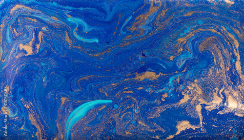 Marbled blue and gold abstract background. Liquid marble pattern.