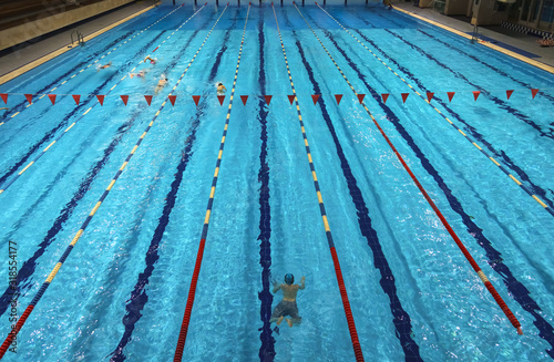  Indoor swimming pool in sport club. Healthy lifestyle concept.