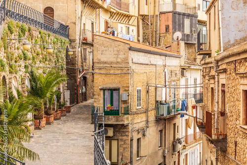 Italy, Sicily, Enna Province, Centuripe. Narrow streets and rustic buildings in the ancient hill town of Centuripe.