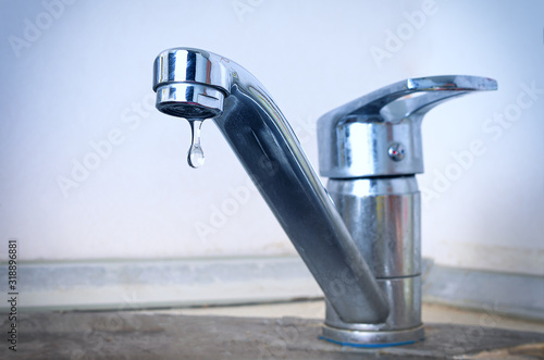 Water dripping from a tap