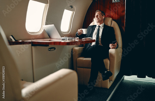 Businessman in private jet