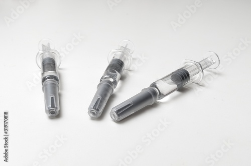 Generic prefilled vaccine syringes. Close-up studio shot.