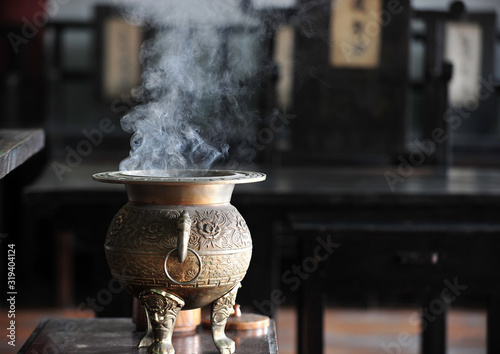 Incense burning at the bronze incense burner