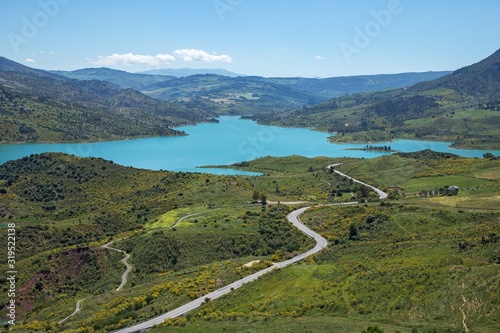 Water reservoir near Zahara de la sierra white village in Andalusia, Spain