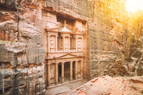El Hazne famous rock temple-mausoleum, Treasury of Pharaoh. in the ancient city of Petra, Jordan: Incredible UNESCO World Heritage Site. An ancient structure with high columns carved into the rock