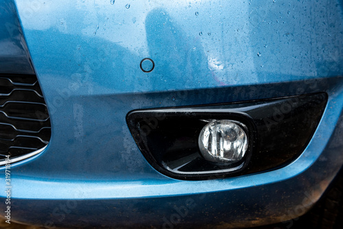 Close-up of modern fog lights on car.