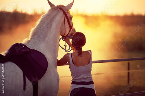 Best way to start a day. Fun on countryside with horse, sunset golden hour. Freedom nature concept.