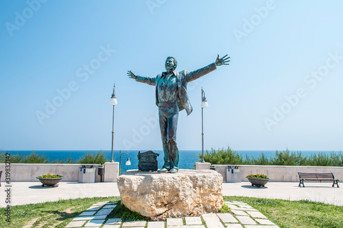 Domenico modugno statue in Polignano a Mare, Puglia, Italy