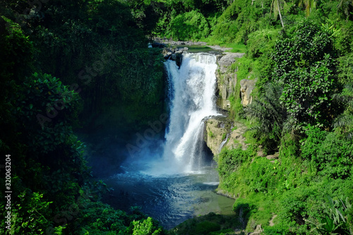 Beautiful scenery of the majestic Tegenungan waterfall, Bali