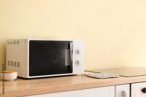 Modern microwave oven in kitchen