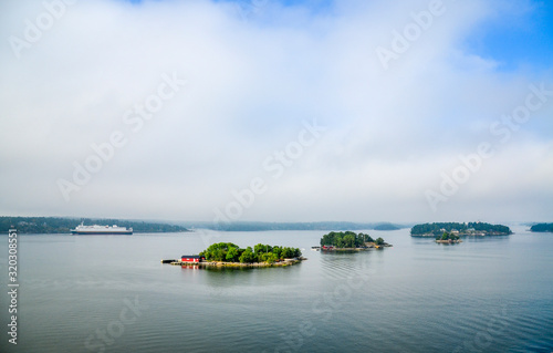 Dwellings islands on Stockholm archipelago in Baltic sea at sunny morning, Sweden