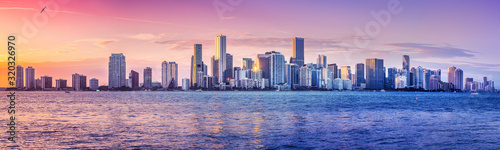 the skyline of miami while sunset
