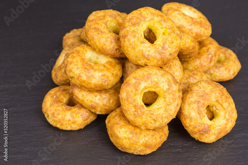sweet and salty snack - corn puff donuts with peanuts and caramel