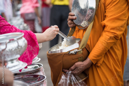 offer food to monk, Sangkhlaburi