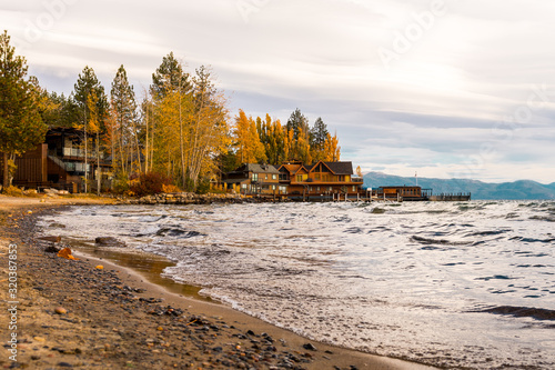 Sunset view over the houses and docks on the shore of Lake Tahoe