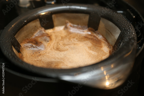 coffee brewing, coffee grounds in basket
